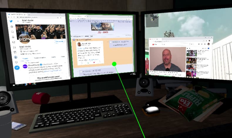 interaction with screen A desk with two screens displaying YouTube videos, a video game, Twitter and 4Chan messages — an interaction pointer is selecting the 4Chan message posts.